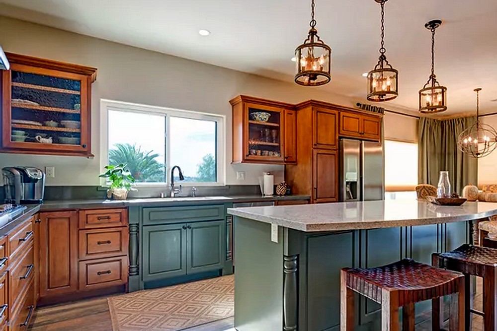 Custom kitchen remodel on Ivory Drive San Diego CA with green island cabinetry by Concepts by Design